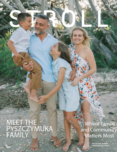 June 2026 STROLL Beachwalk magazine cover showing the Pyszczymuka family on the beach with the headline Meet the Pyszczymuka Family
